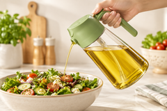 Oil pouring over a salad